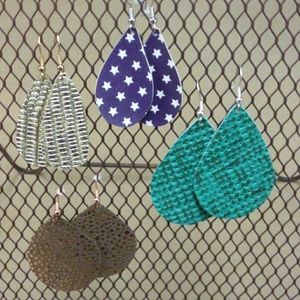 Set of four handcrafted leather earrings.